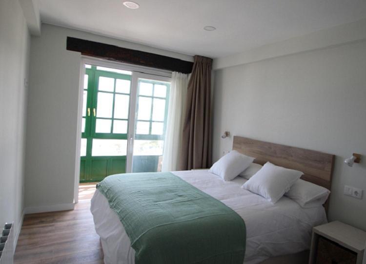 Apartamentos El Muelle Comillas Exteriör bild