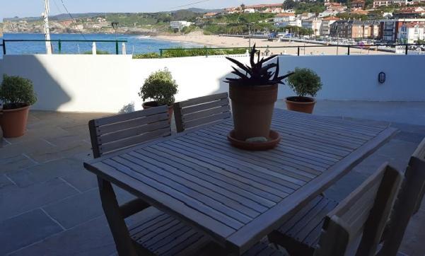Apartamentos El Muelle Comillas Exteriör bild
