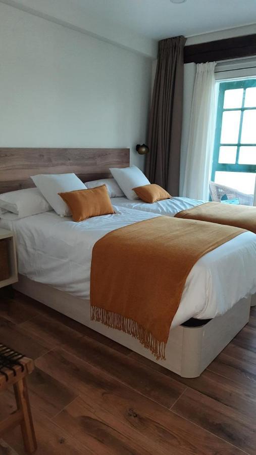 Apartamentos El Muelle Comillas Exteriör bild